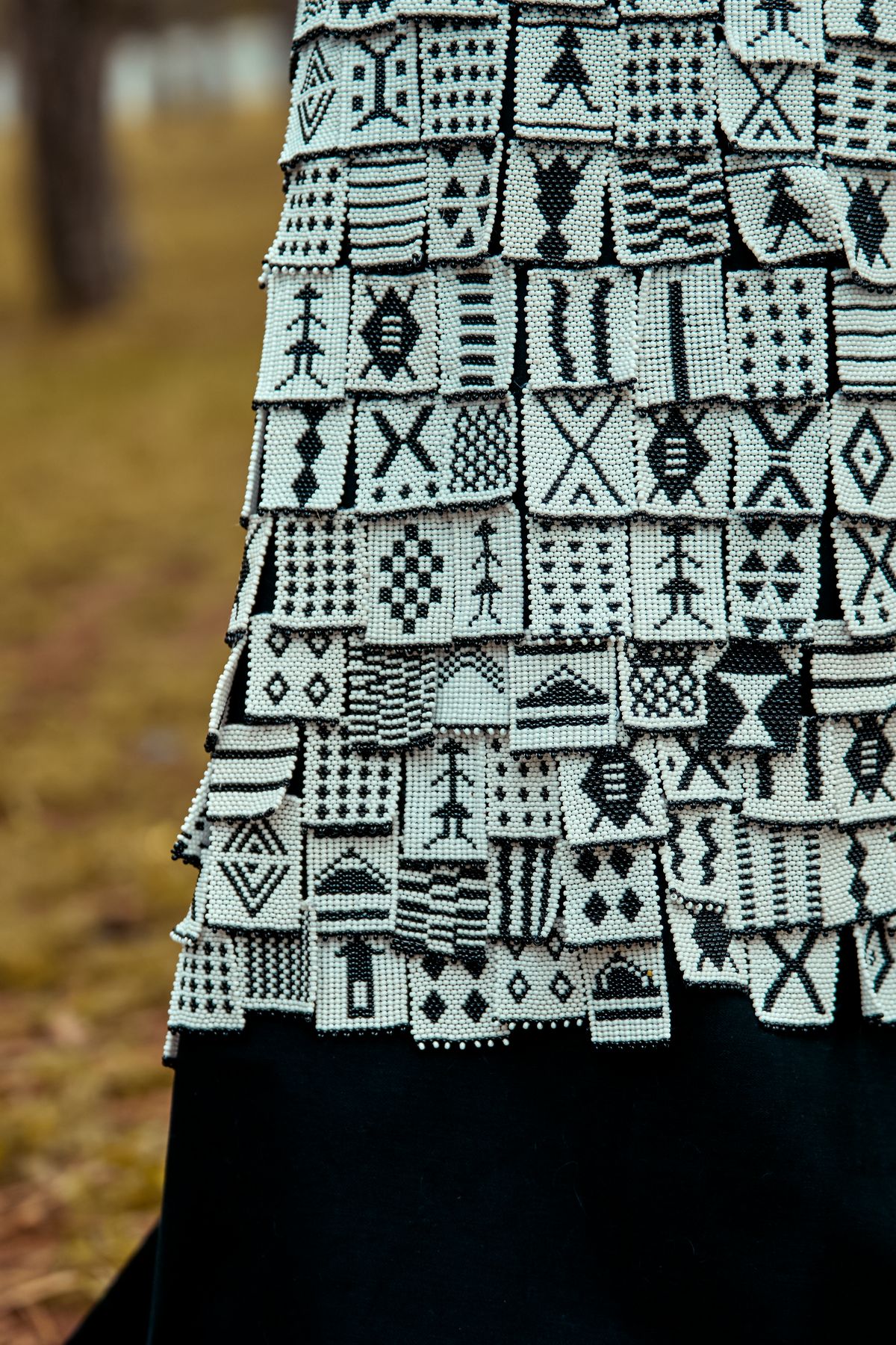 XHOSA LOVE LETTER, A display of Xhosa LOVE letters on a cotton wrap skirt 1017672847072032578